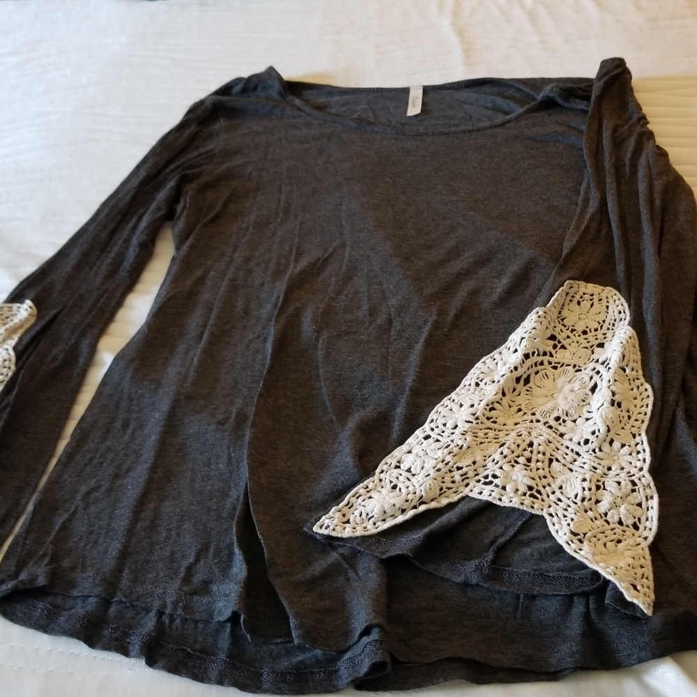 Top with crocheted sleeves